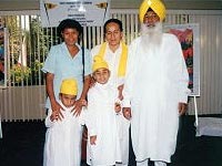 Photo of Partap Singh with family and a friend.