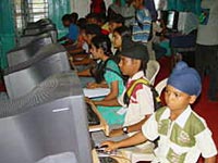 Students at the UNITED SIKHS Computer Center