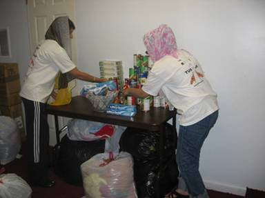 Volunteers Packing Relief Material for Shipment