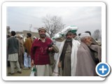 Flood victims receiveing rice at charsadda