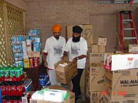 UNITED SIKHS volunteers organising supplies brought in.