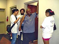 Dr. Sagina Kaur and Dr. Darshan Singh treating a patient